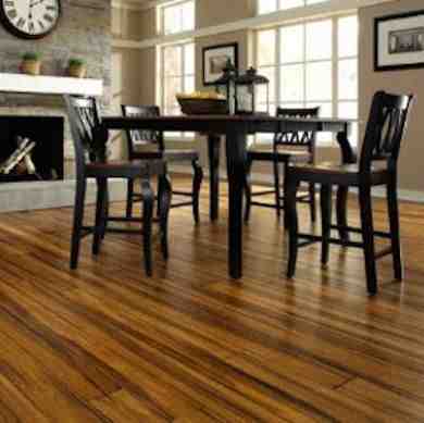 Can I use tar paper under hardwood flooring?