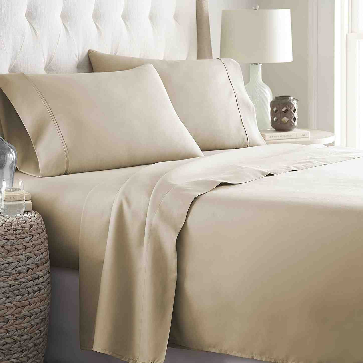 Can I put King sheets on a queen bed?