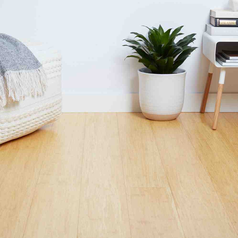 How do you dry water under a wood floor?