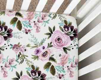 How do you wash a mushie crib sheet?