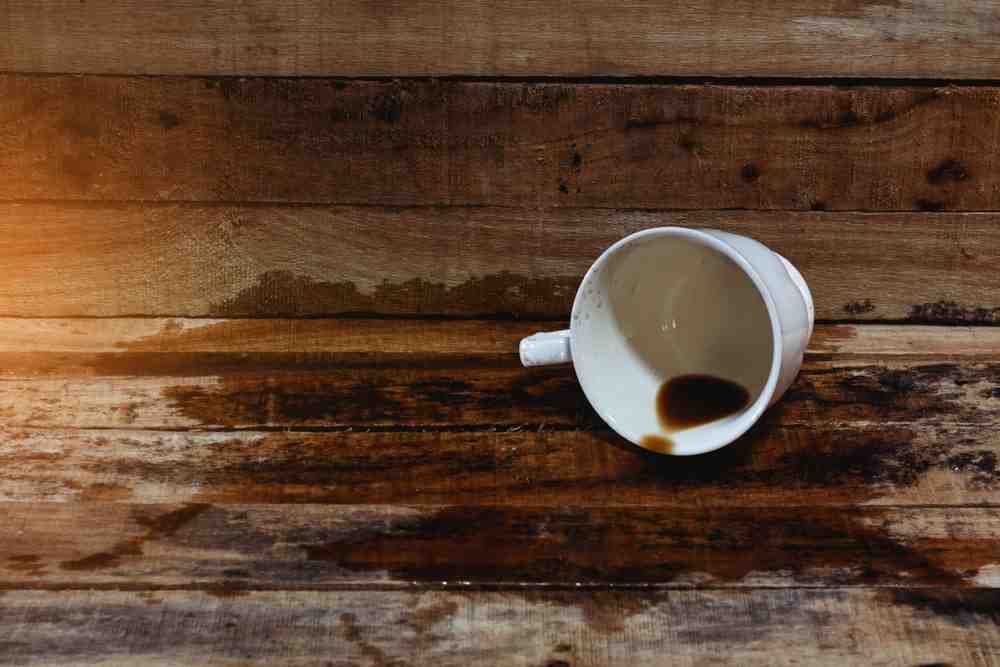 How do you reverse cupping on hardwood floors?