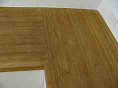 How do you keep bamboo floors from scratching?